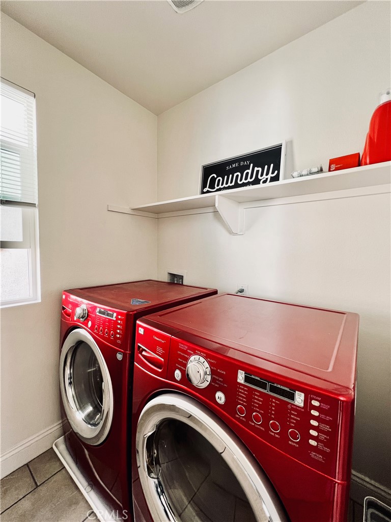 1207 Alpine Circle Baldwin Park, CA 91706 - Photo 17 of 38 a utility room with dryer and washer