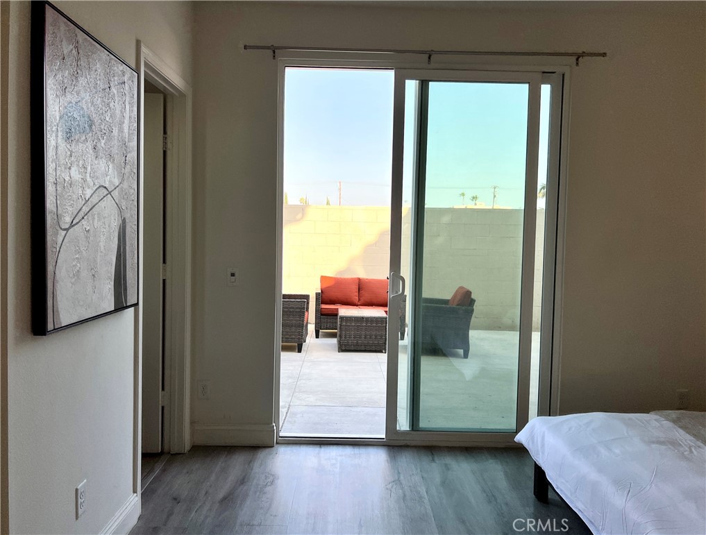 1207 Alpine Circle Baldwin Park, CA 91706 - Photo 20 of 38 a bedroom with a bed and a mirror