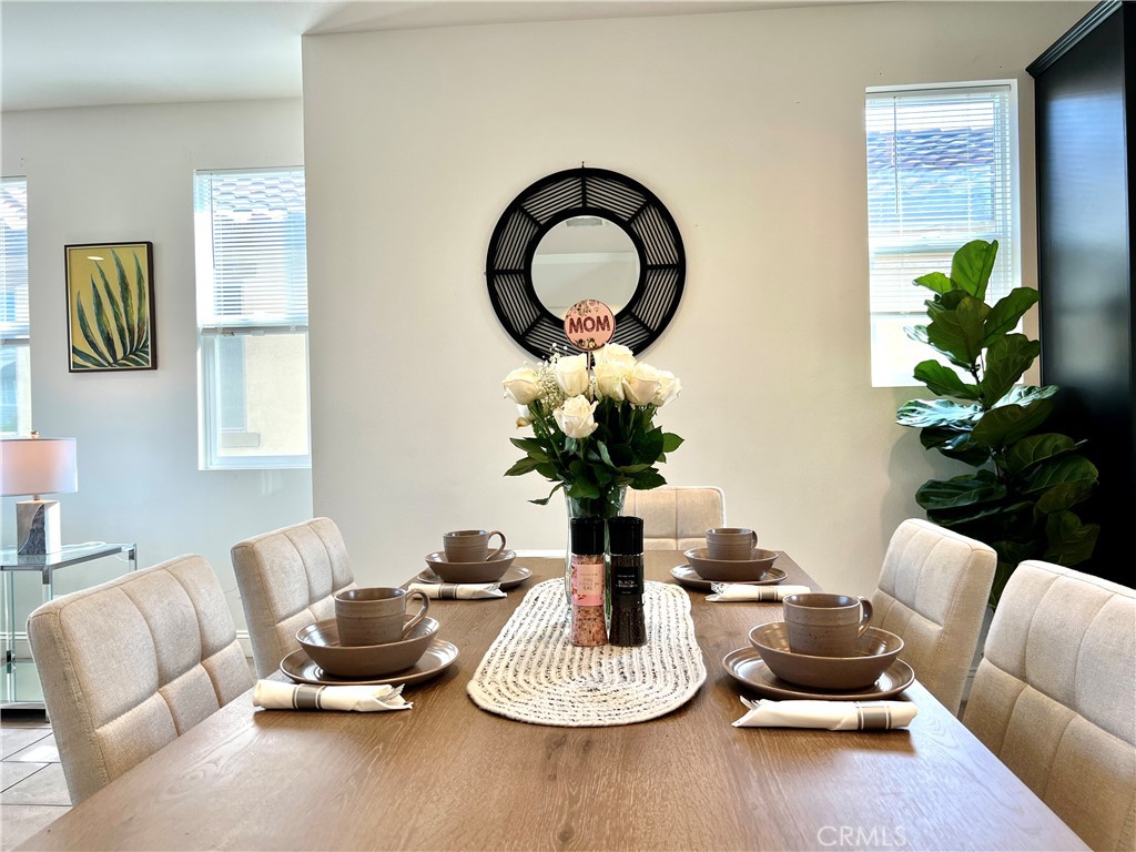 1207 Alpine Circle Baldwin Park, CA 91706 - Photo 2 of 38 a living room with furniture and a potted plant