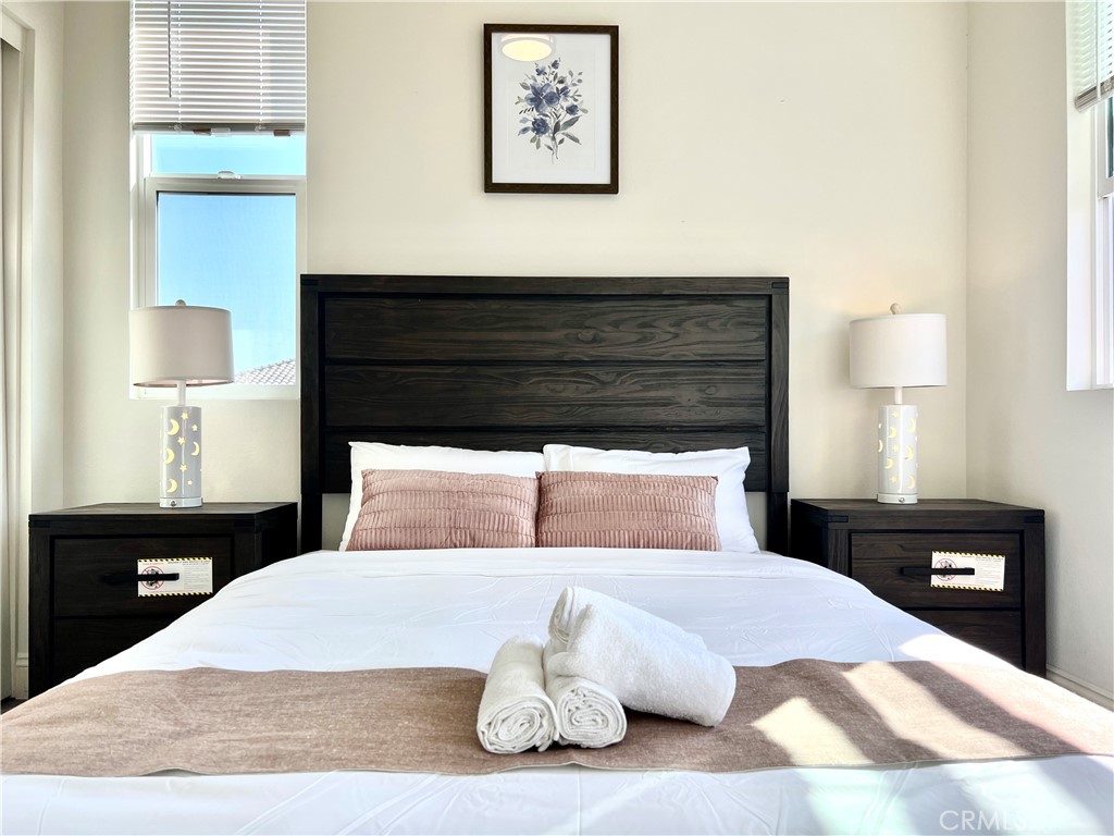 1207 Alpine Circle Baldwin Park, CA 91706 - Photo 22 of 38 a bedroom with a bed and a night stand