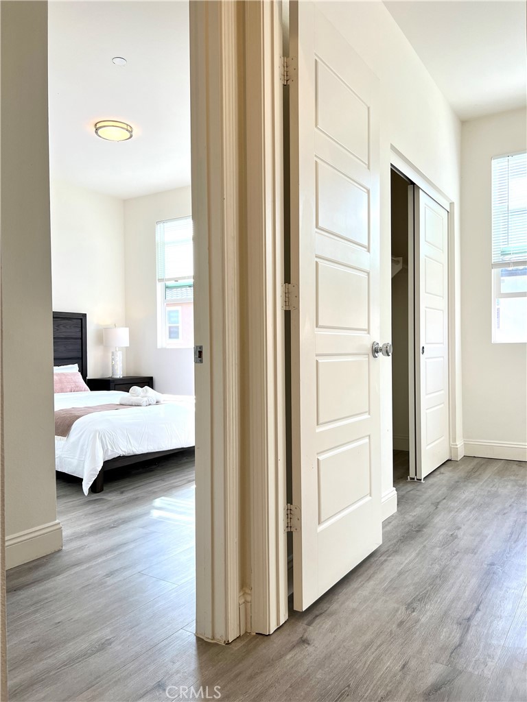 1207 Alpine Circle Baldwin Park, CA 91706 - Photo 28 of 38 a bedroom with a bed and wooden floor