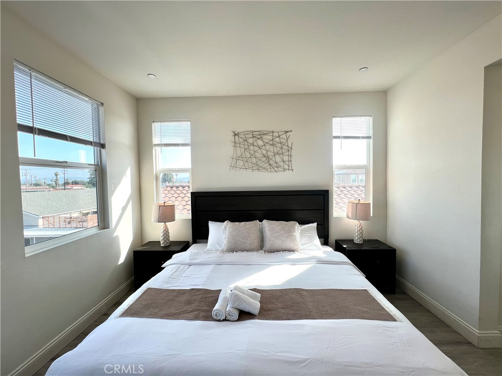 1207 Alpine Circle Baldwin Park, CA 91706 - Photo 35 of 38 a bedroom with a bed and window