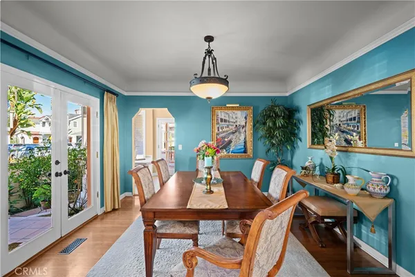 a kitchen with granite countertop a refrigerator and a sink