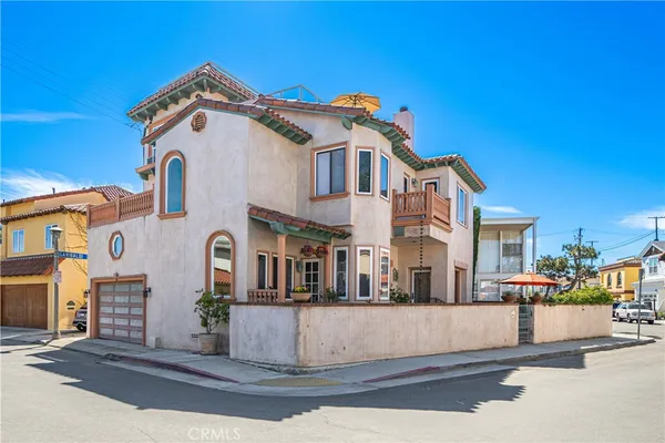 a front view of a house with a garage