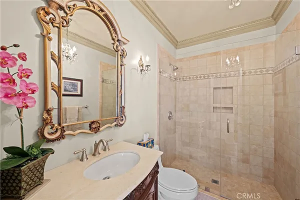 a bed room with a bed and a television