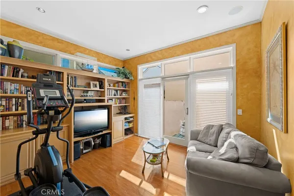 a bathroom with a tub a double vanity sink and a mirror