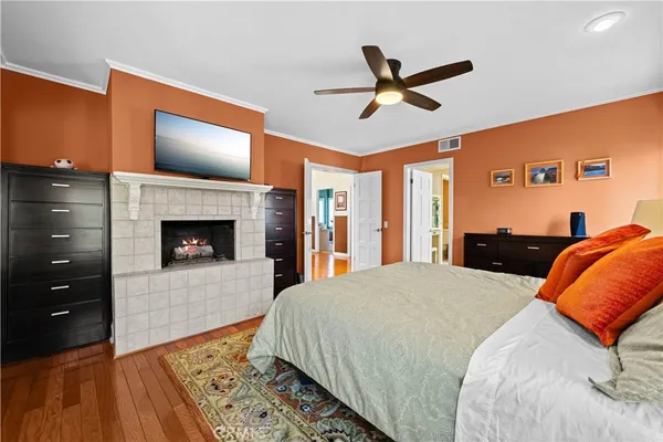 a bedroom with a bed and dresser