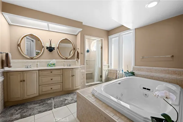 a bathroom with a bathtub and shower