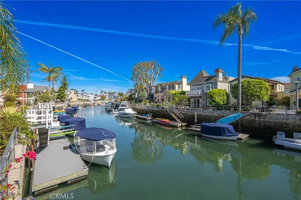 a view of a backyard with furniture and a patio