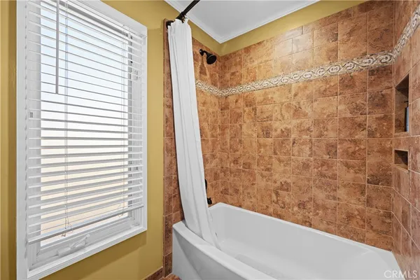 a view of a chairs and table in the balcony