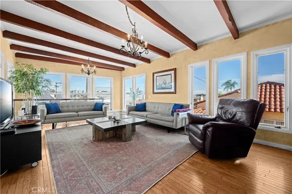 an aerial view of a house with a ocean view