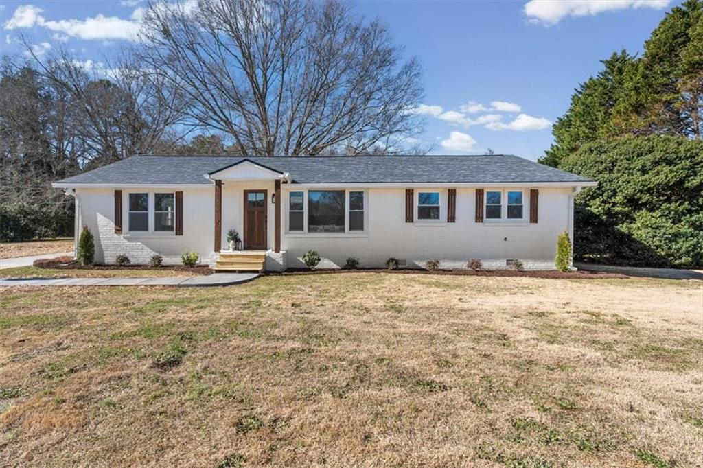 a house view with a garden space