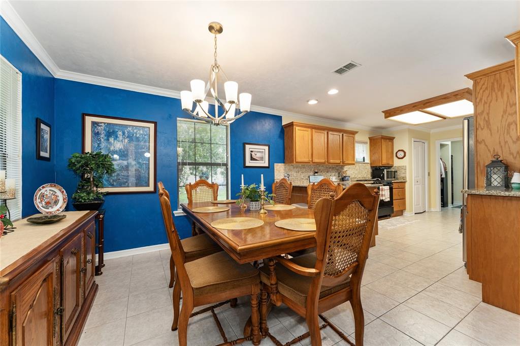 10922 Palmetto Boulevard Alachua, FL 32615 - Photo 16 of 51 a view of a dining room and livingroom view