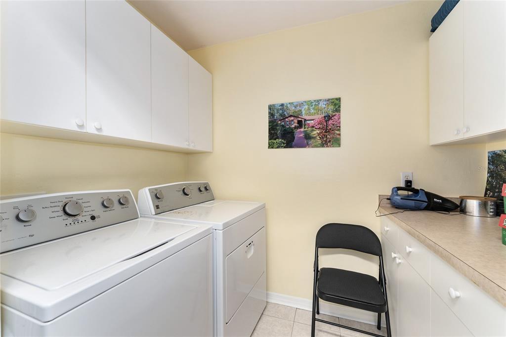 10922 Palmetto Boulevard Alachua, FL 32615 - Photo 28 of 51 a room with storage and utility