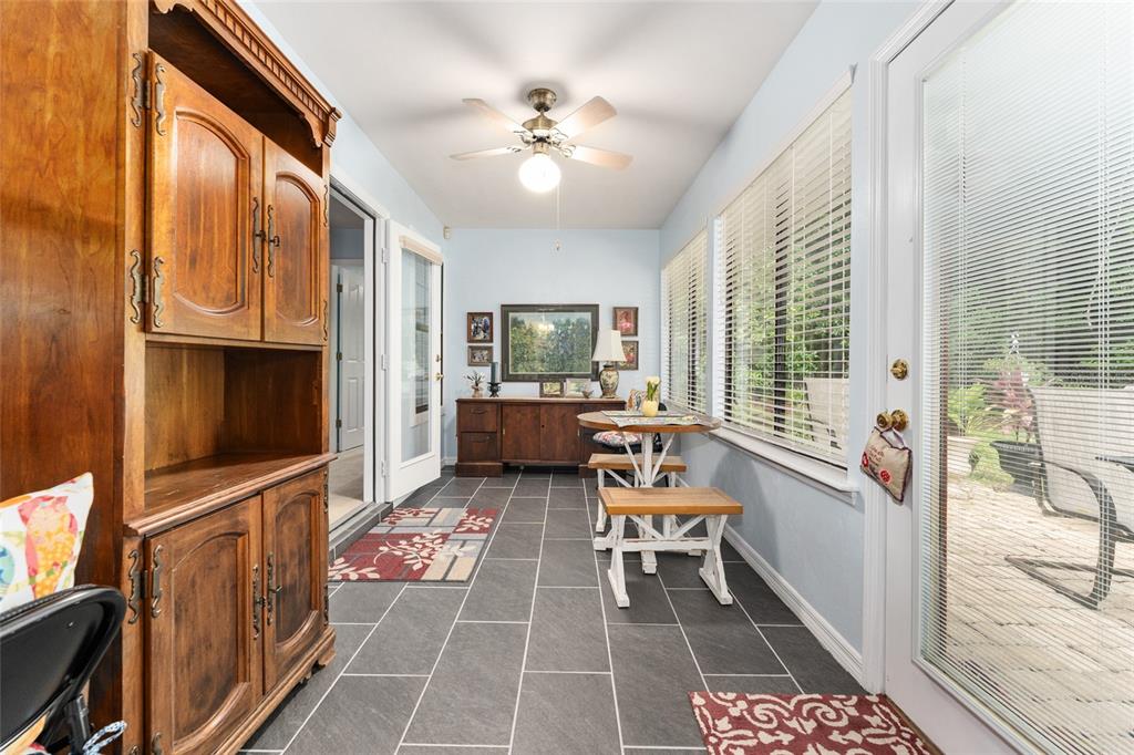 10922 Palmetto Boulevard Alachua, FL 32615 - Photo 30 of 51 a theatre with furniture and a rug