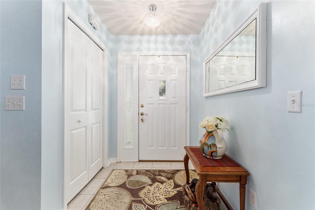 10922 Palmetto Boulevard Alachua, FL 32615 - Photo 6 of 51 a room that has painting on the wall and a table