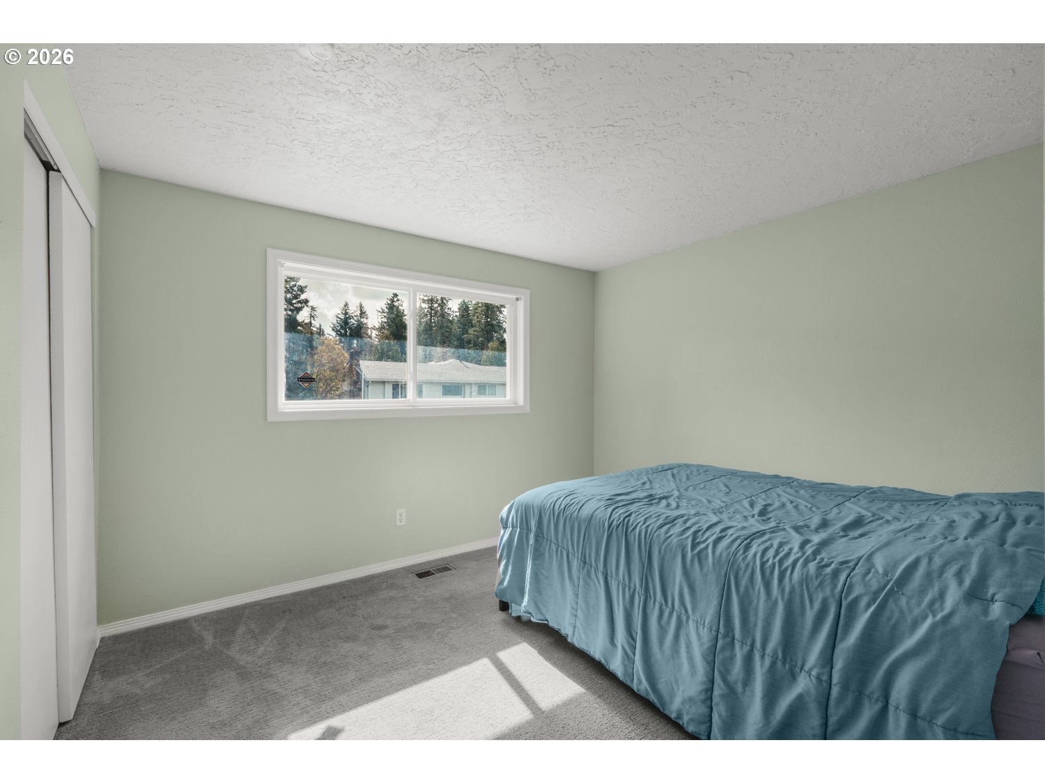1829 Southwest 17th Street Gresham, OR 97080 - Photo 14 of 27 a bedroom with a bed and a painting on the wall