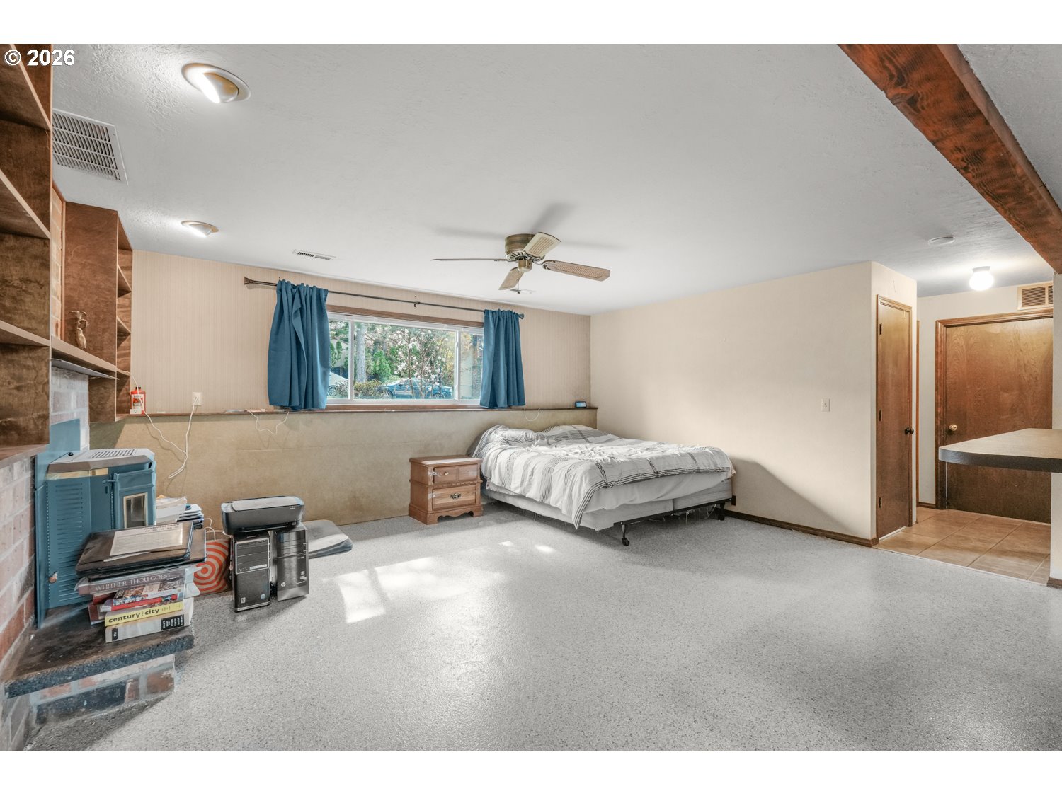 1829 Southwest 17th Street Gresham, OR 97080 - Photo 17 of 27 a bedroom with furniture and a large window