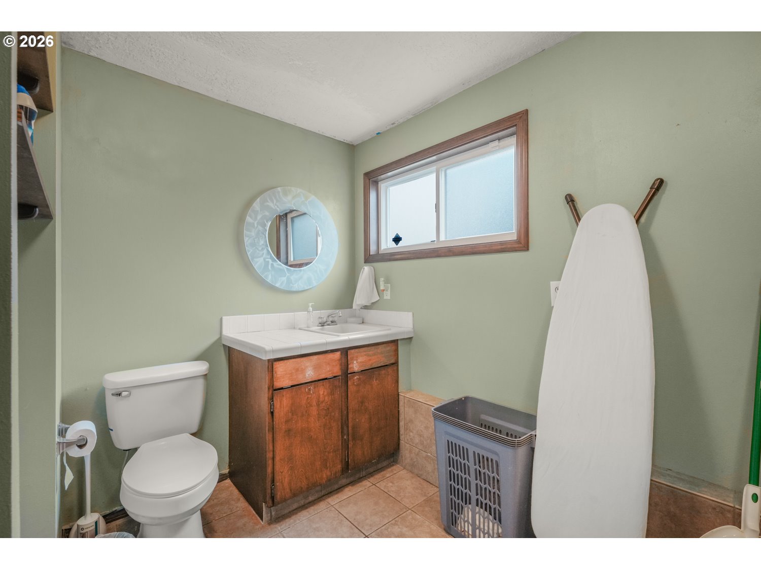 1829 Southwest 17th Street Gresham, OR 97080 - Photo 21 of 27 a bathroom with a toilet sink vanity granite and mirror