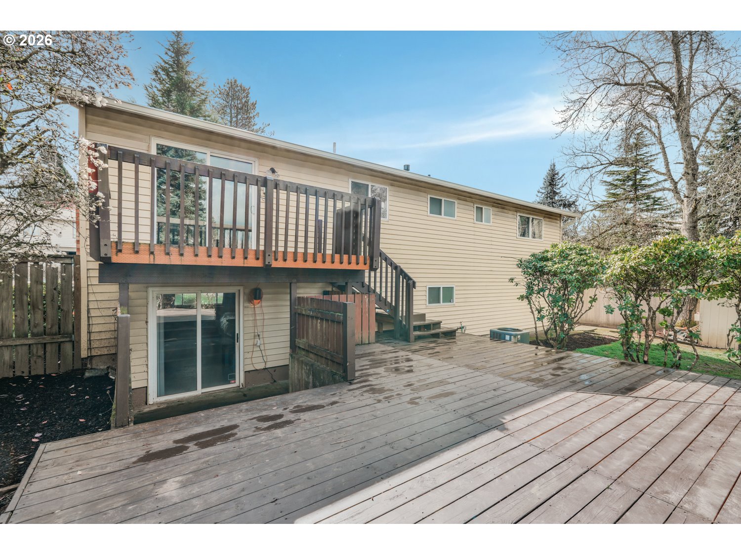 1829 Southwest 17th Street Gresham, OR 97080 - Photo 23 of 27 a view of backyard with wooden floor and fence
