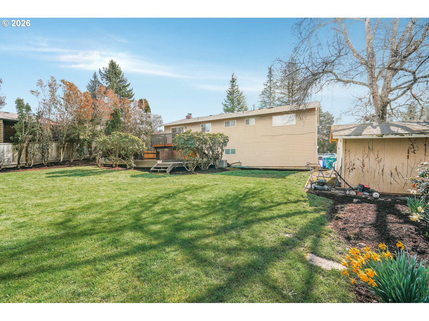 1829 Southwest 17th Street Gresham, OR 97080 - Photo 25 of 27 a backyard of a house with lots of green space