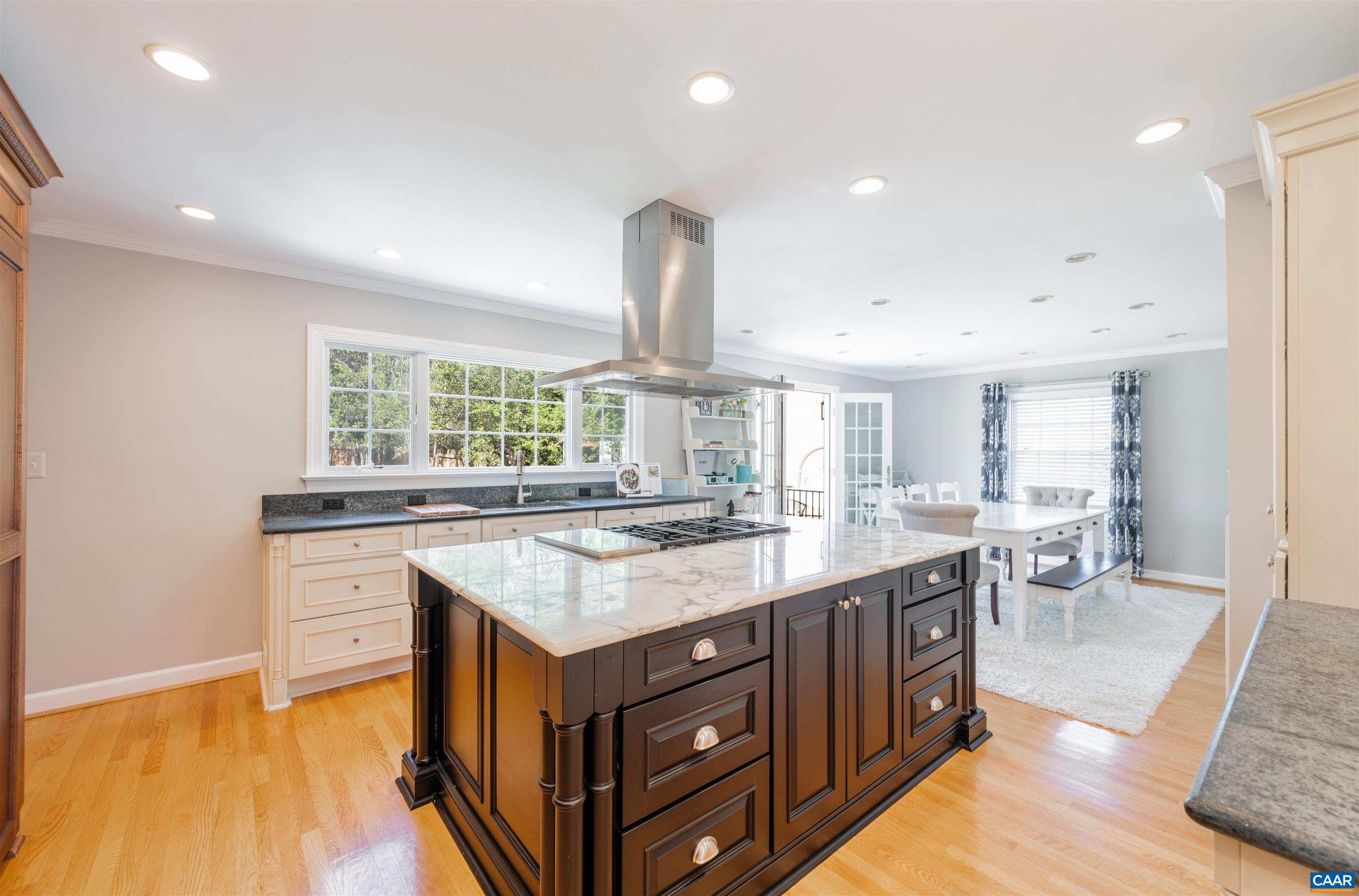 2600 Bennington Road Charlottesville, VA 22901 - Photo 13 of 60 a kitchen with a stove a sink and a refrigerator