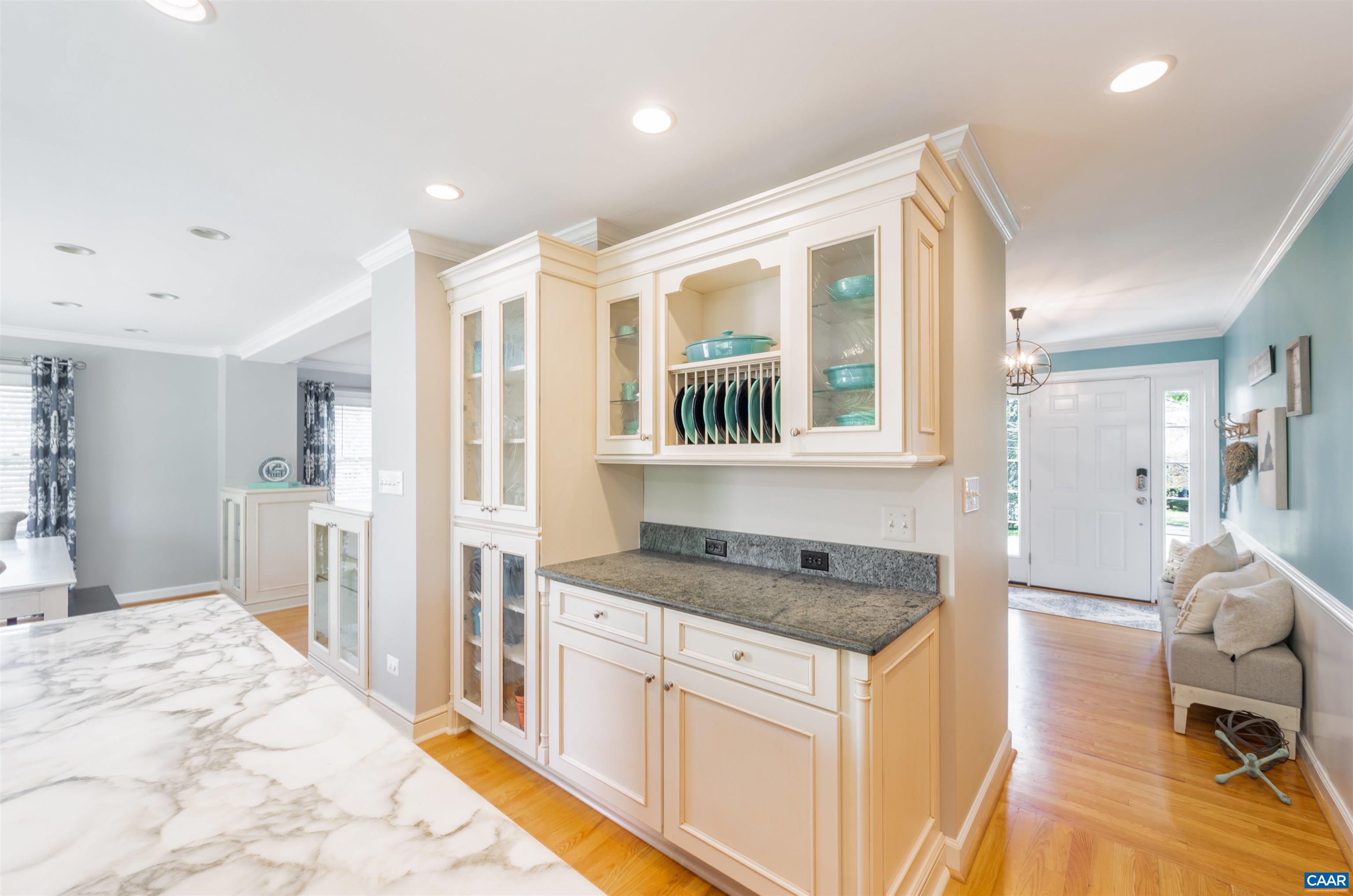 2600 Bennington Road Charlottesville, VA 22901 - Photo 17 of 60 a kitchen that has a lot of cabinets and wooden floor