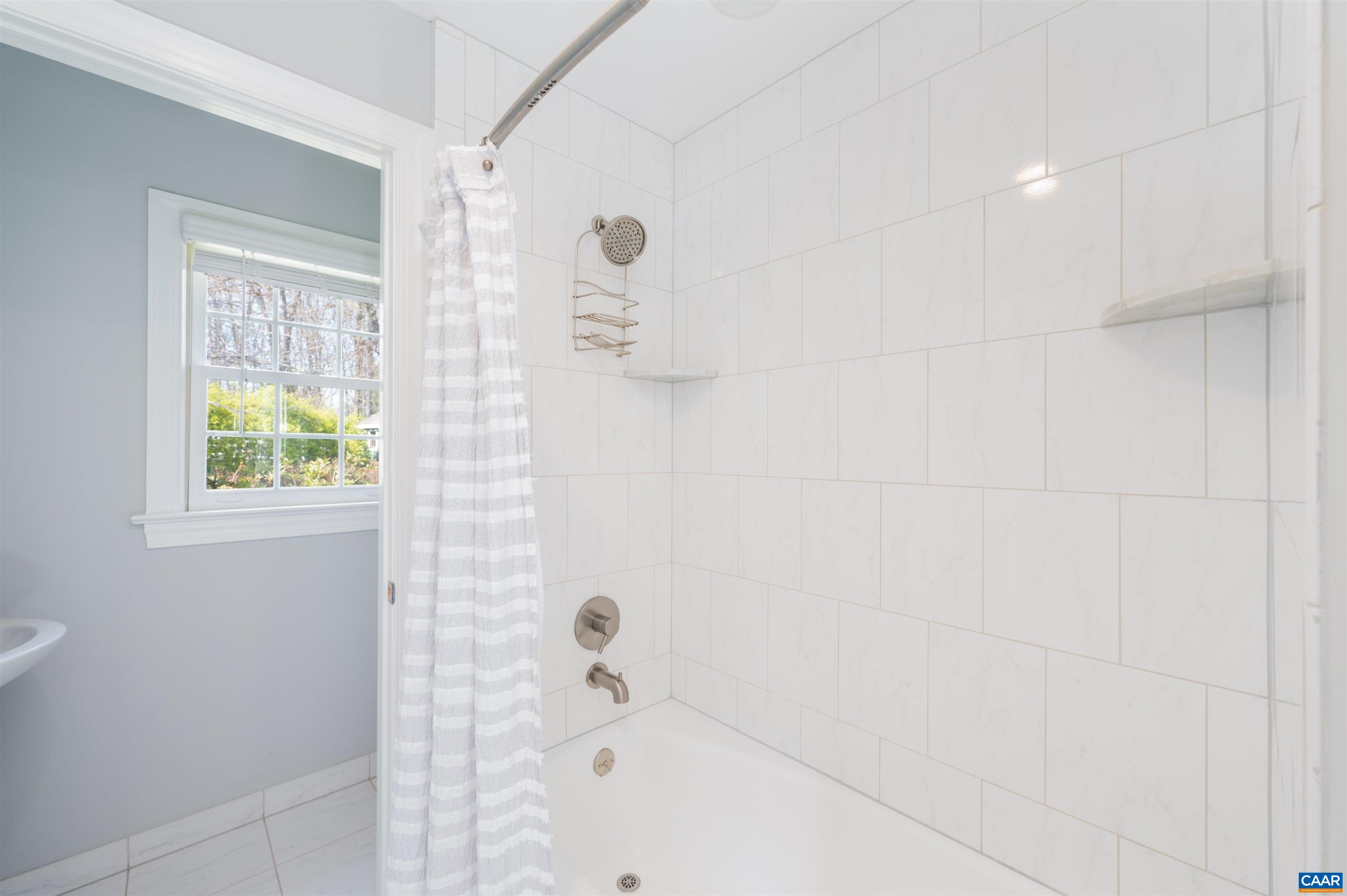 2600 Bennington Road Charlottesville, VA 22901 - Photo 22 of 60 a bathroom with a bathtub and shower