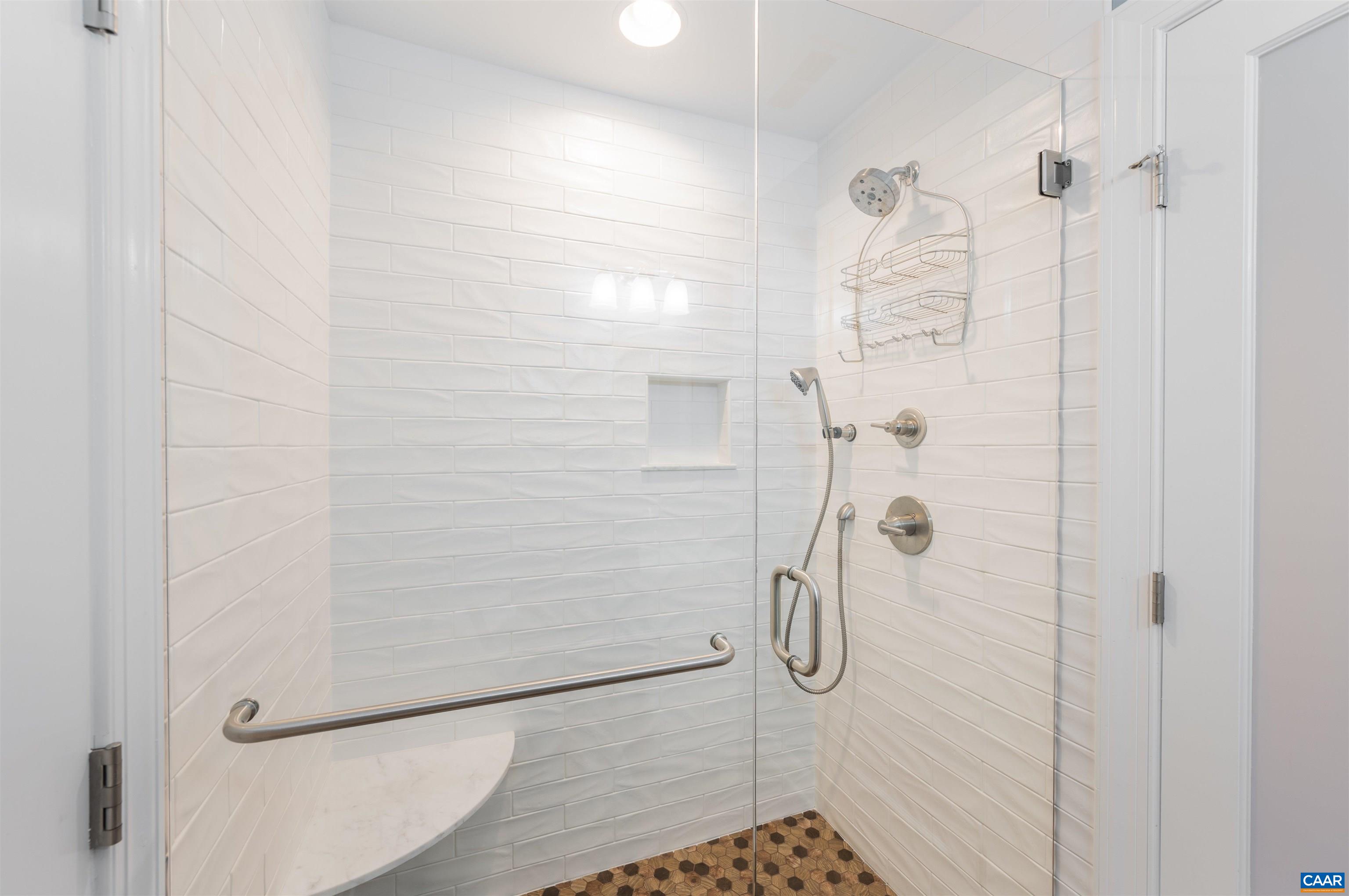 2600 Bennington Road Charlottesville, VA 22901 - Photo 43 of 60 a bathroom with a glass shower door