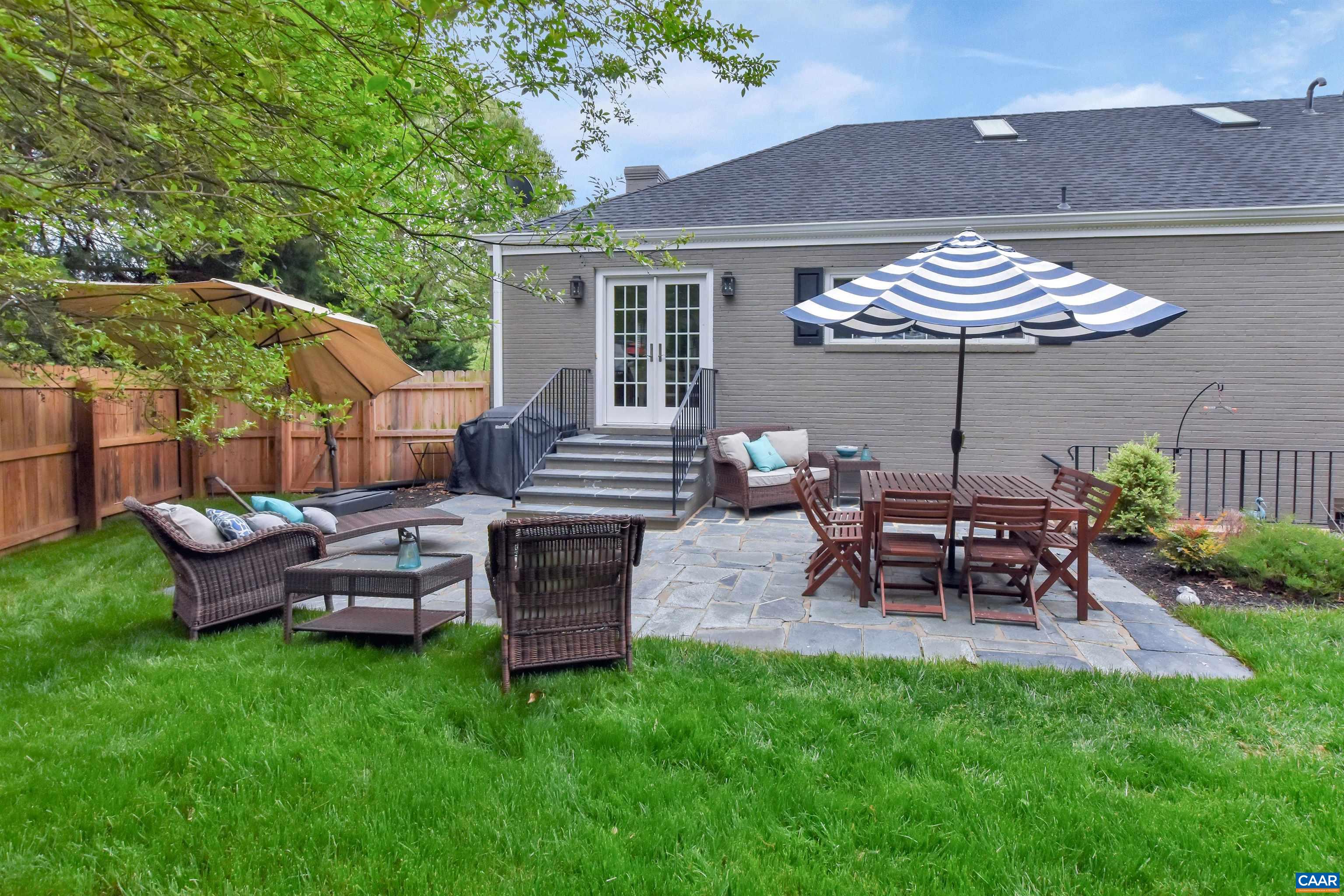 2600 Bennington Road Charlottesville, VA 22901 - Photo 50 of 60 a view of a house with a backyard and chairs