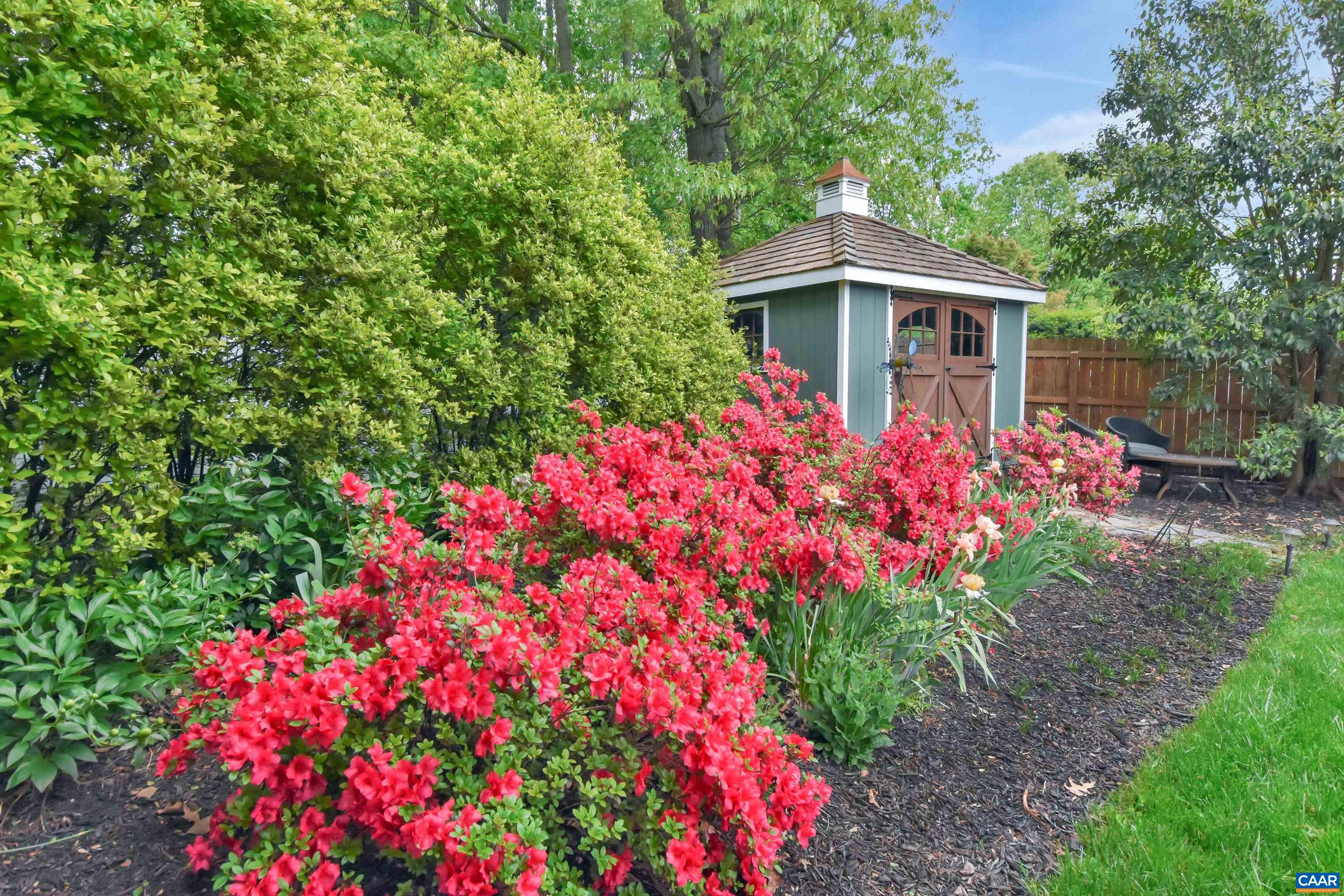 2600 Bennington Road Charlottesville, VA 22901 - Photo 55 of 60 a front view of a house with a yard and fountain