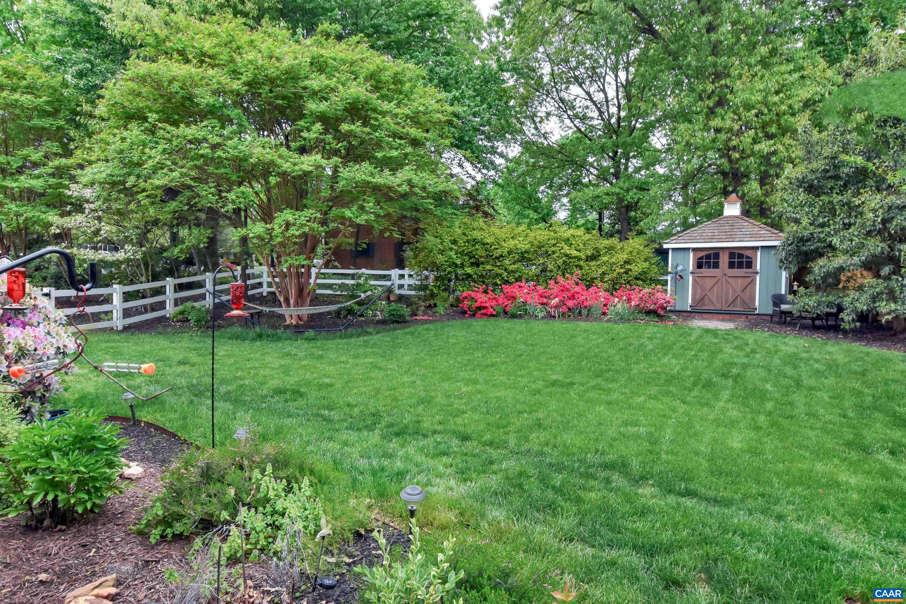 2600 Bennington Road Charlottesville, VA 22901 - Photo 8 of 60 a view of a backyard with plants and a garden