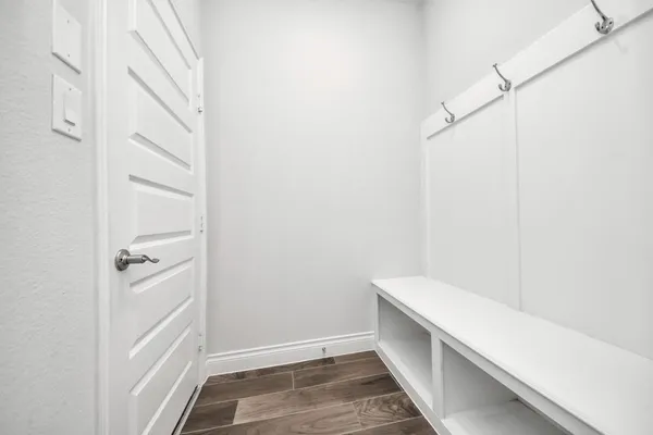 a kitchen with a stove a sink and a refrigerator