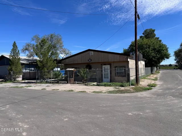 a outdoor view of a house with a street