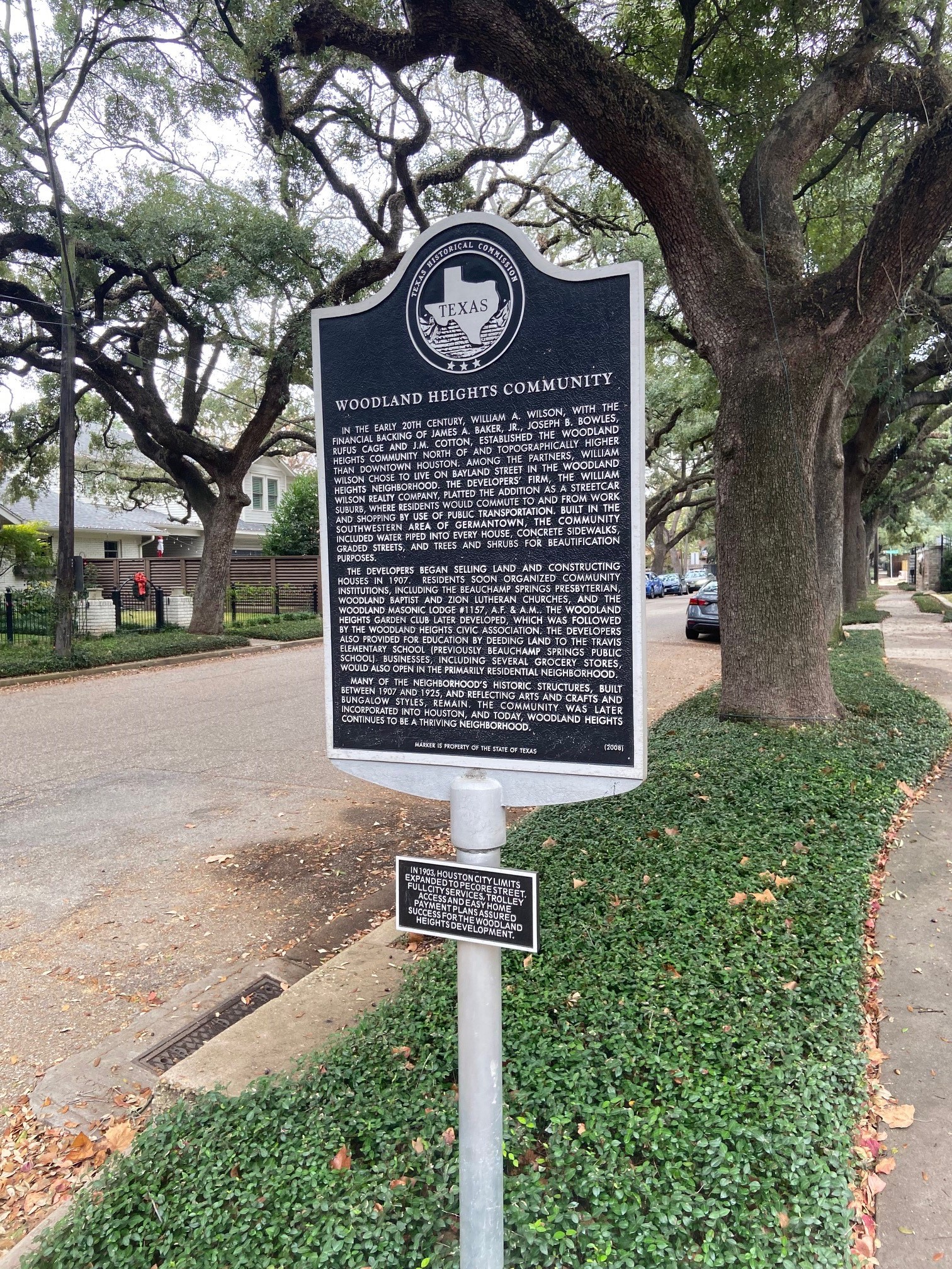 3310 Morrison Street Houston, TX 77009 - Photo 1 of 18 a sign board with a tree in the background