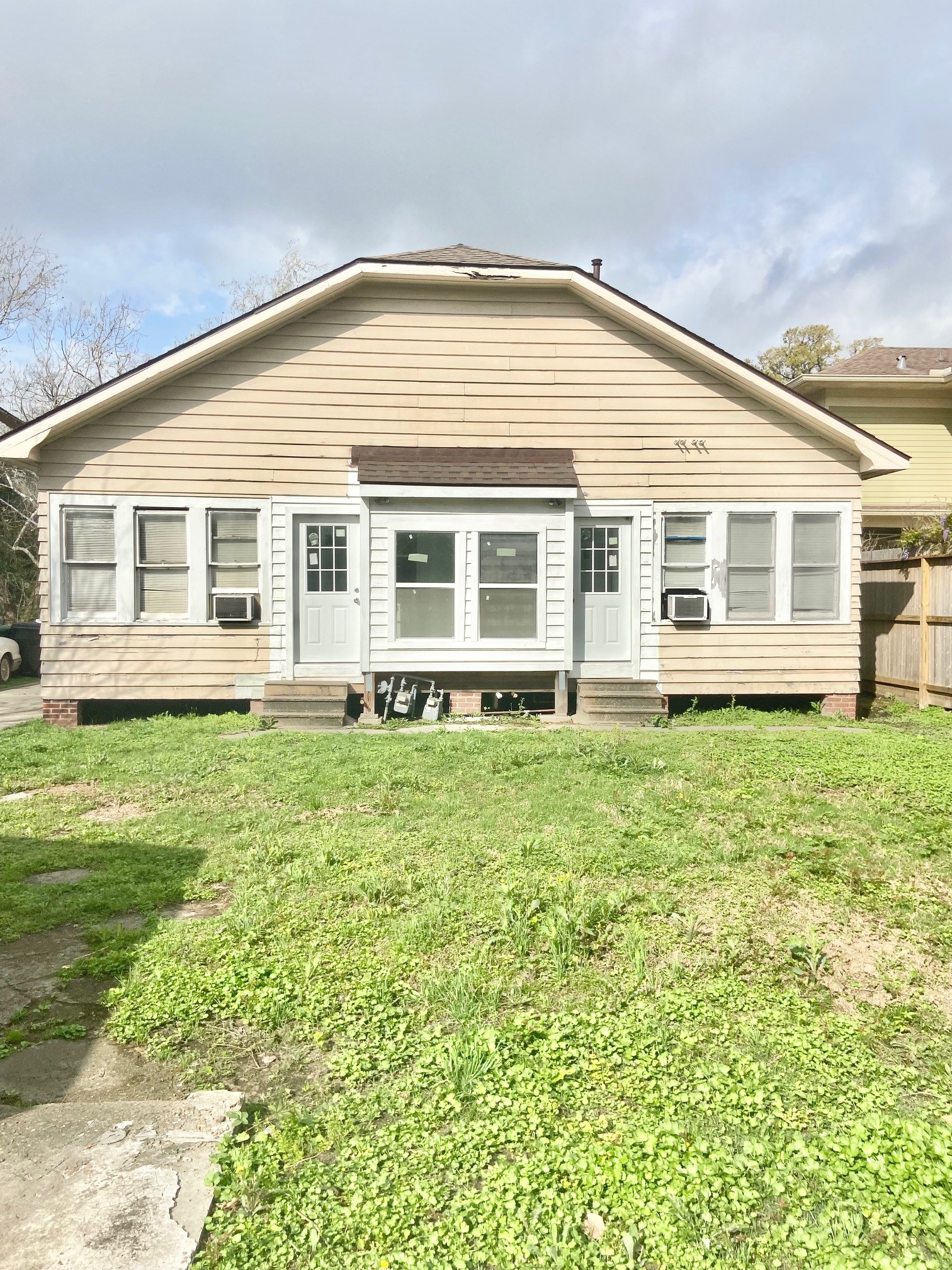 3310 Morrison Street Houston, TX 77009 - Photo 14 of 18 a view of a house with a backyard