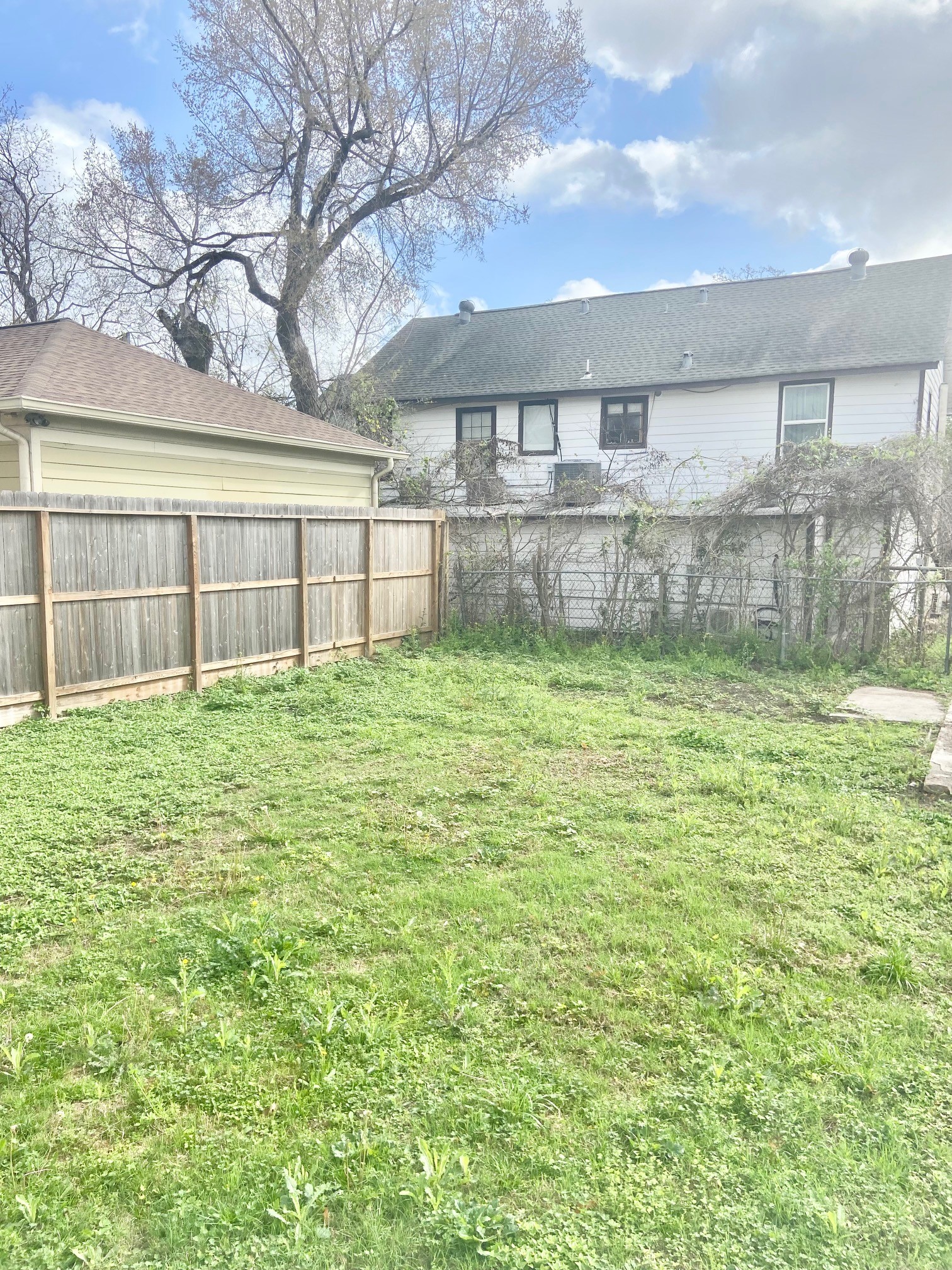 3310 Morrison Street Houston, TX 77009 - Photo 16 of 18 a view of a backyard with a garden