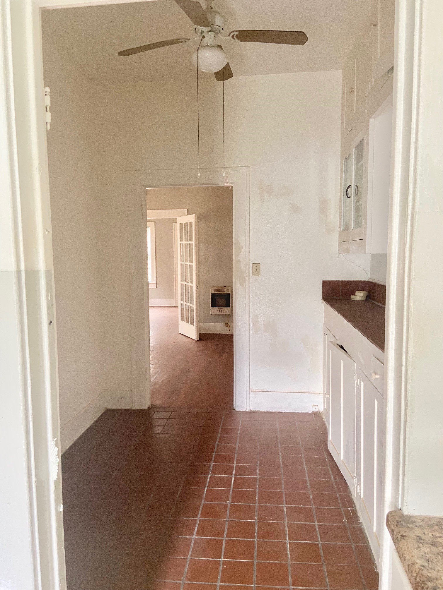 3310 Morrison Street Houston, TX 77009 - Photo 8 of 18 a hallway view with wooden floor and staircase