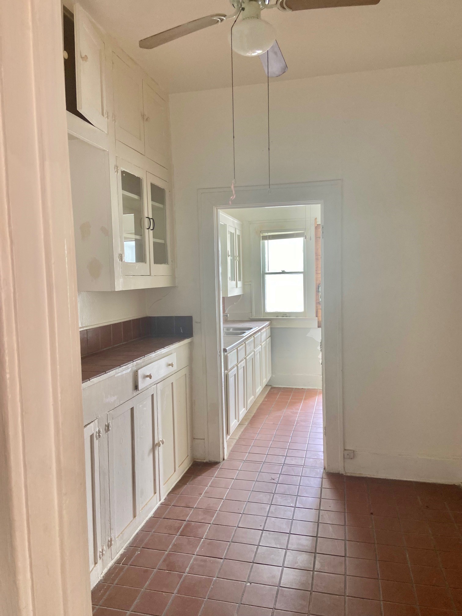 3310 Morrison Street Houston, TX 77009 - Photo 9 of 18 a hallway with cabinets