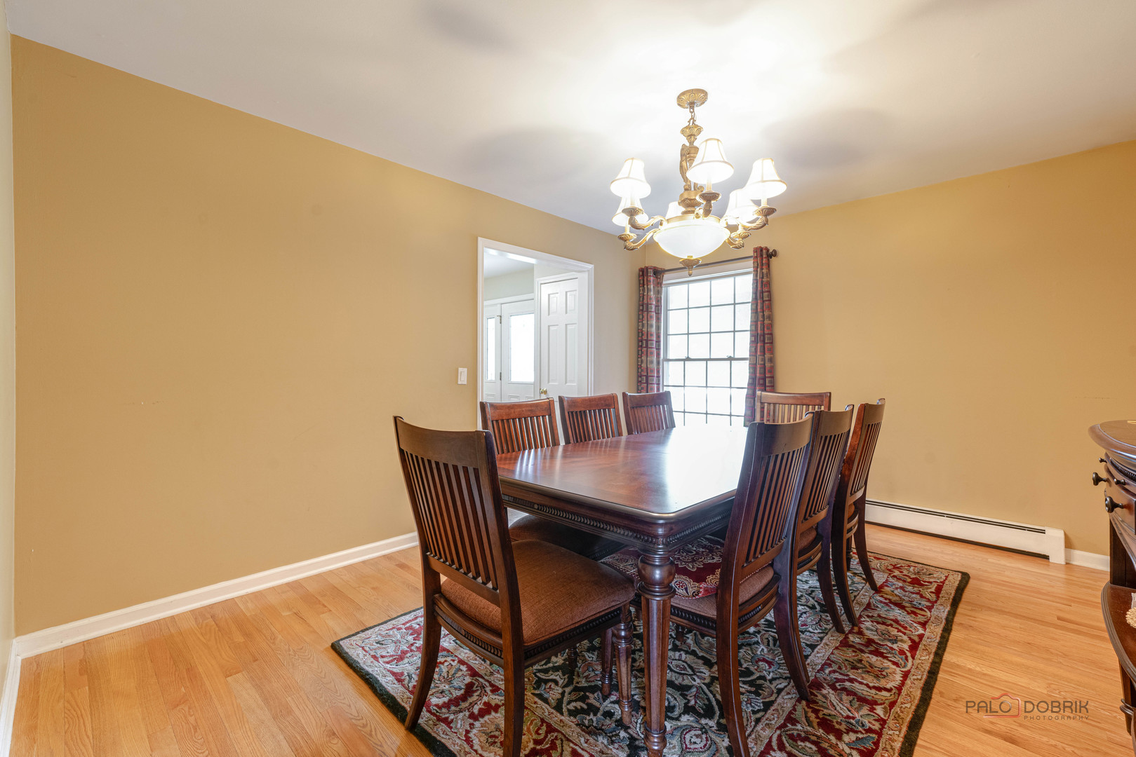 357 Roberts Road Inverness, IL 60010 - Photo 13 of 50 a view of a dining room with furniture and wooden floor