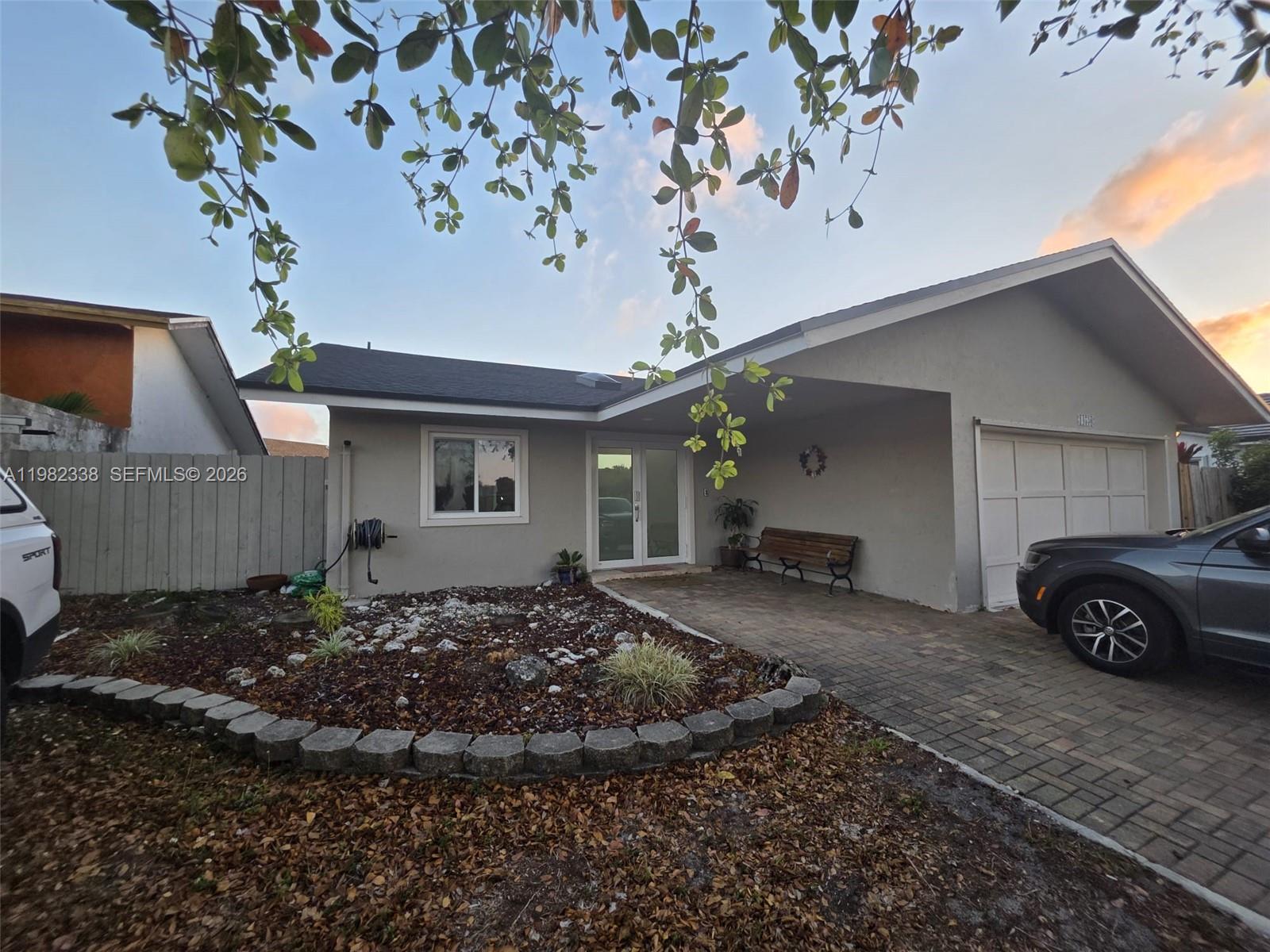 14530 Southwest 110th Street Miami, FL 33186 - Photo 2 of 45 a view of a house with a patio