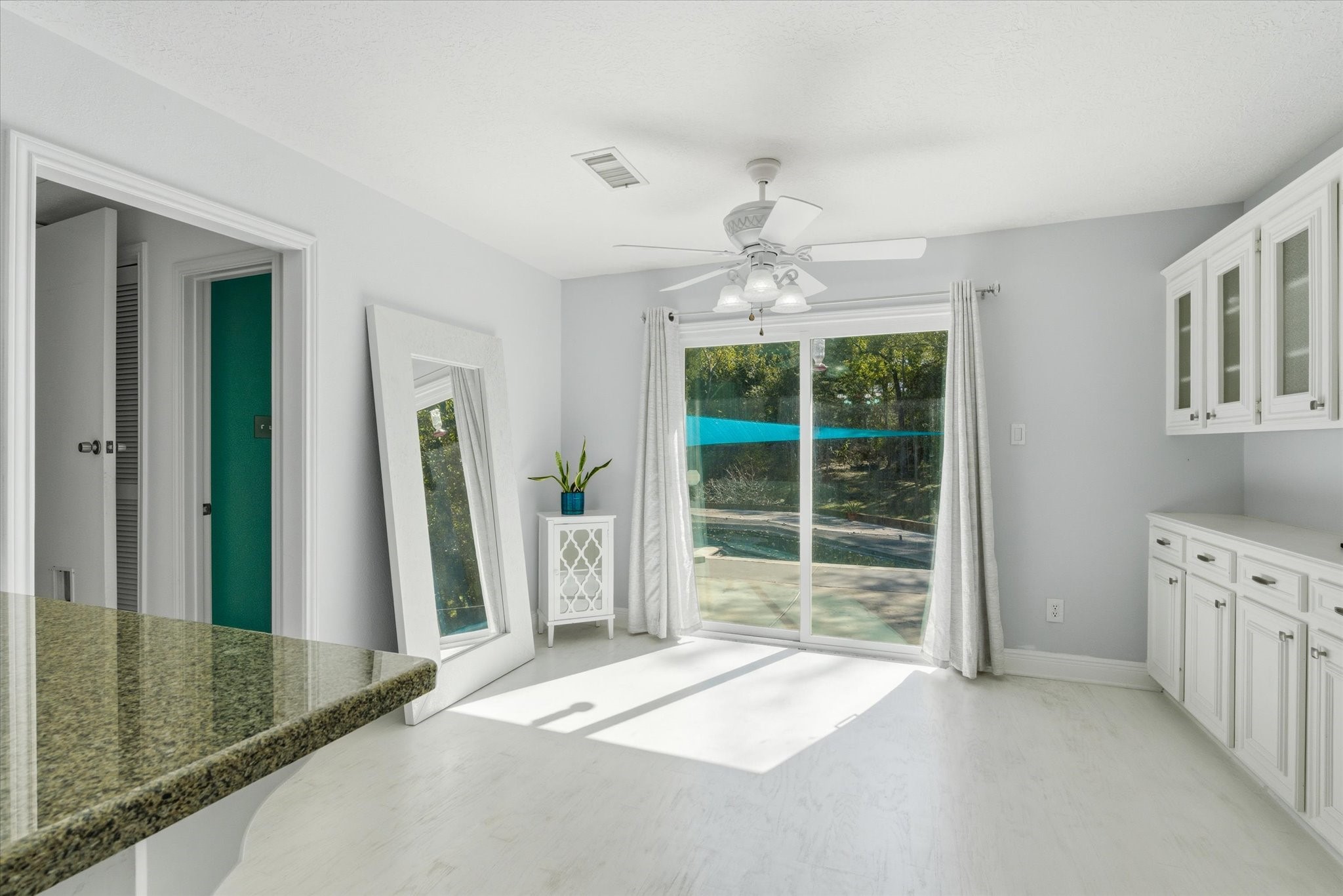 205 Don Q Baytown, TX 77523 - Photo 13 of 27 a view of a room with a flat screen tv