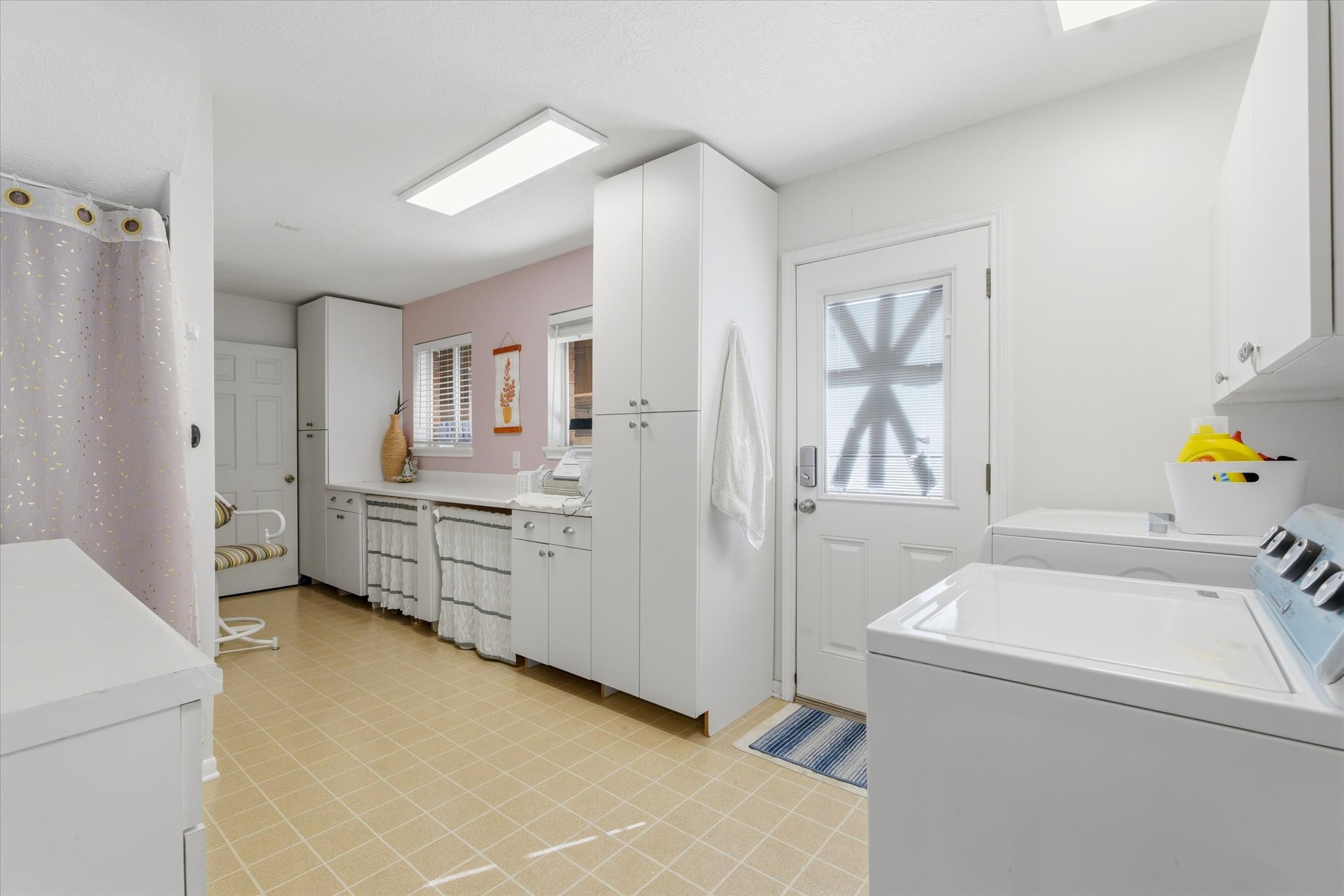 205 Don Q Baytown, TX 77523 - Photo 15 of 27 a view of utility room with washer and dryer