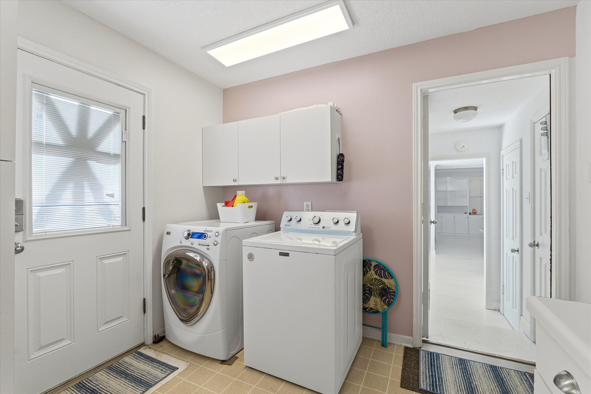 205 Don Q Baytown, TX 77523 - Photo 16 of 27 a utility room with dryer and washer