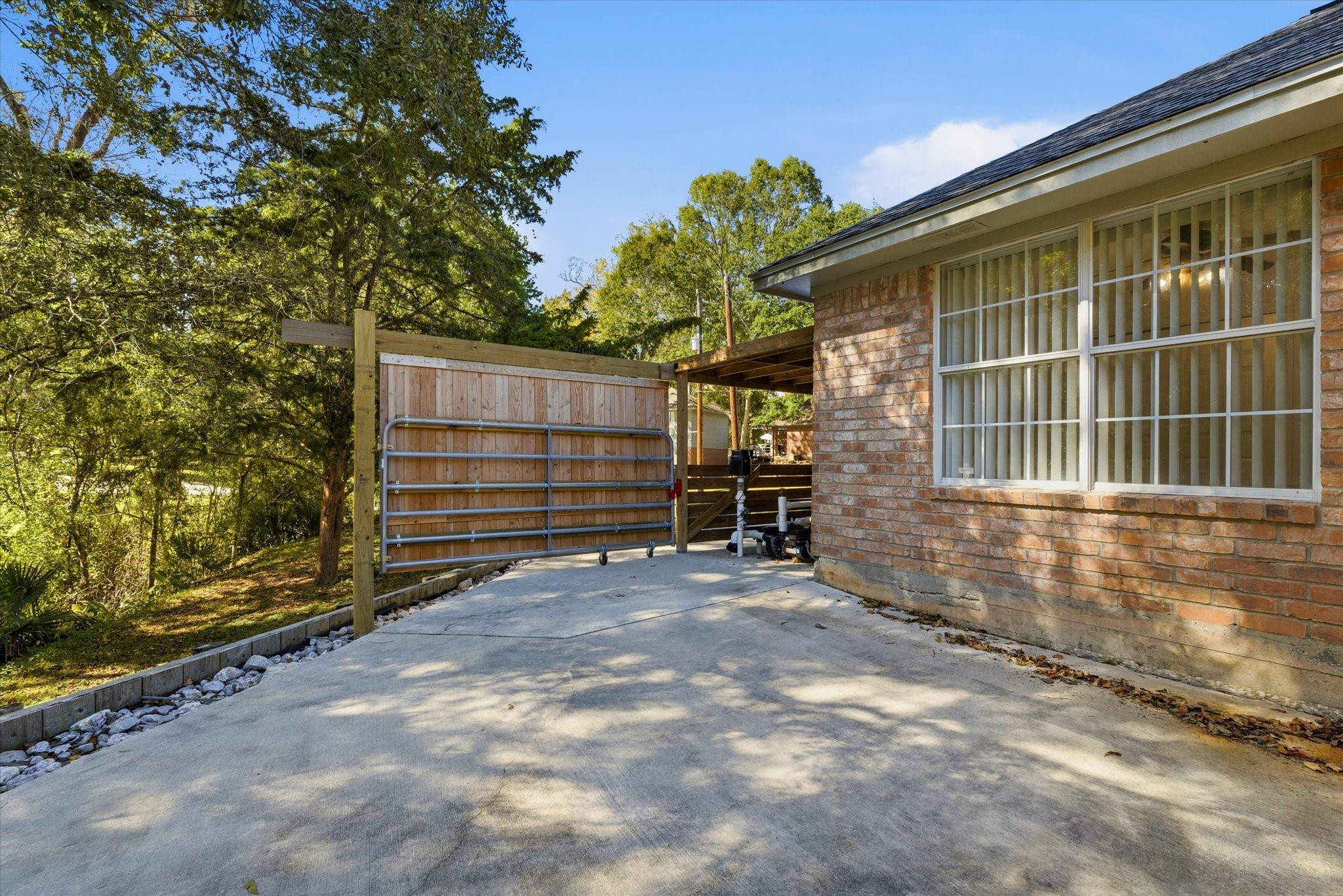 205 Don Q Baytown, TX 77523 - Photo 18 of 27 a view of house with backyard and trees