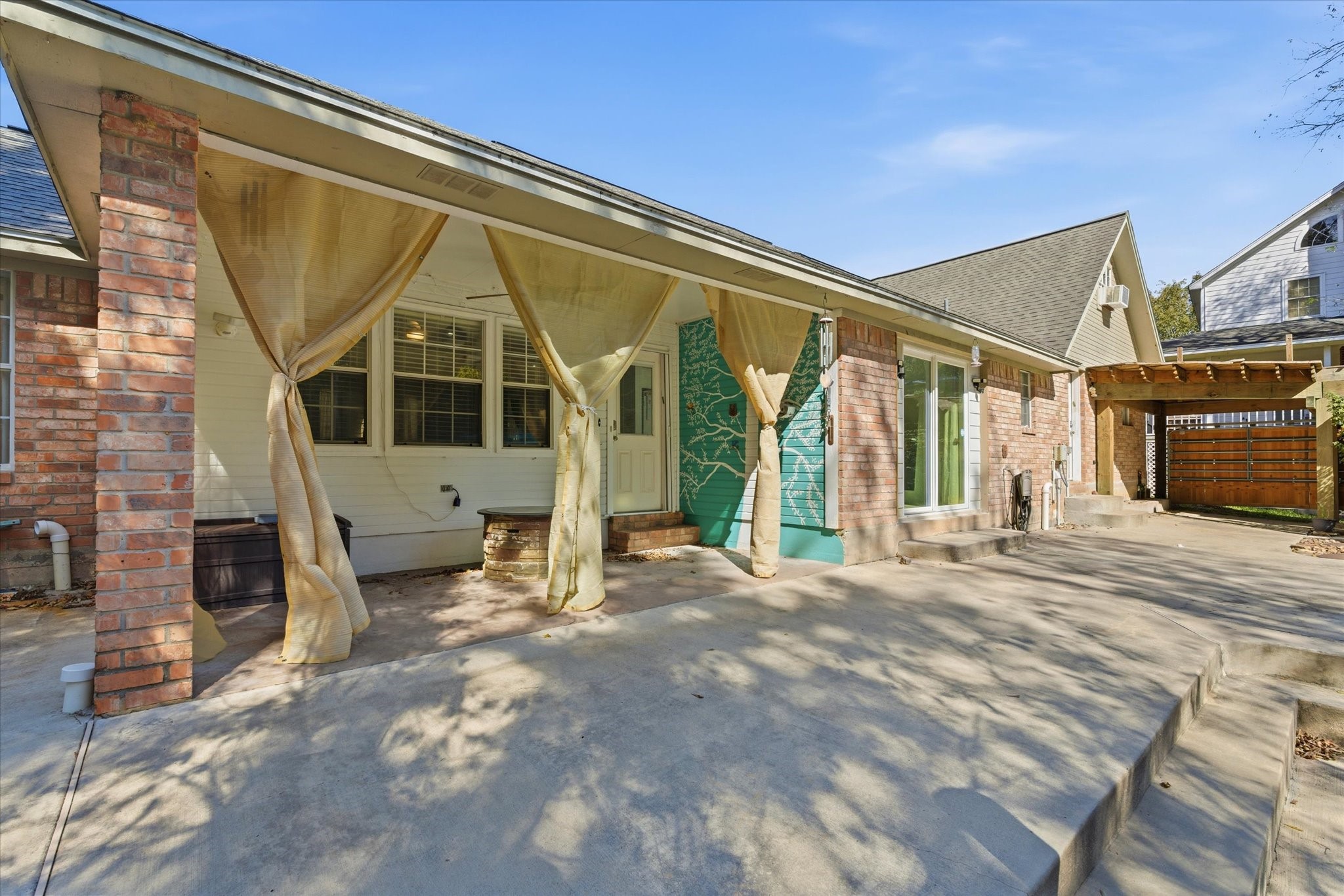 205 Don Q Baytown, TX 77523 - Photo 19 of 27 a view of a house with a backyard and balcony
