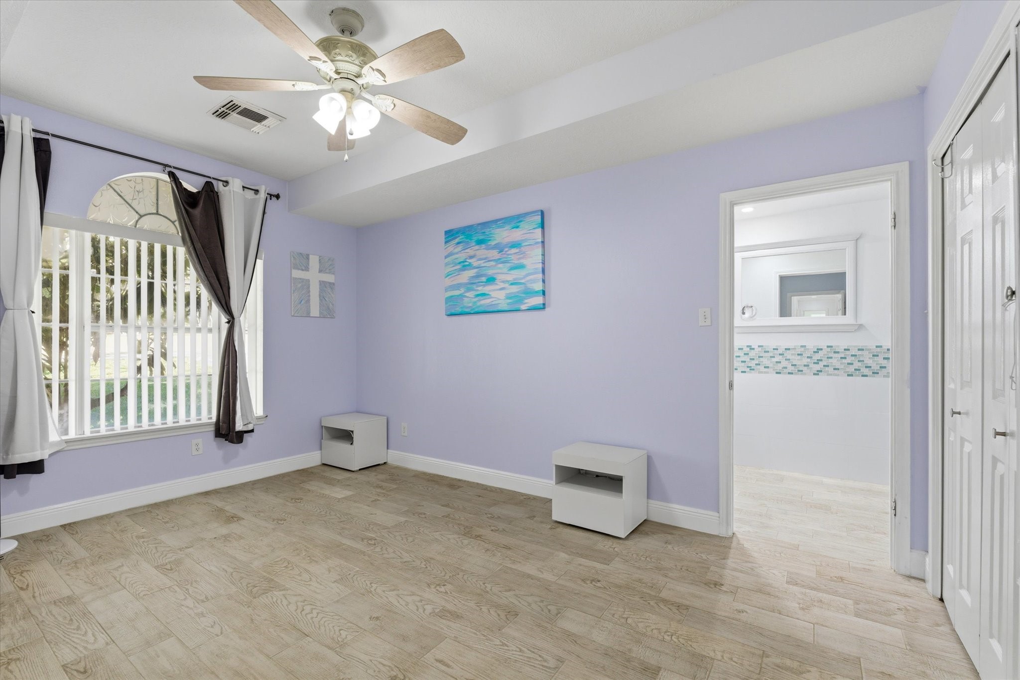 205 Don Q Baytown, TX 77523 - Photo 5 of 27 wooden floor in an empty room with a window