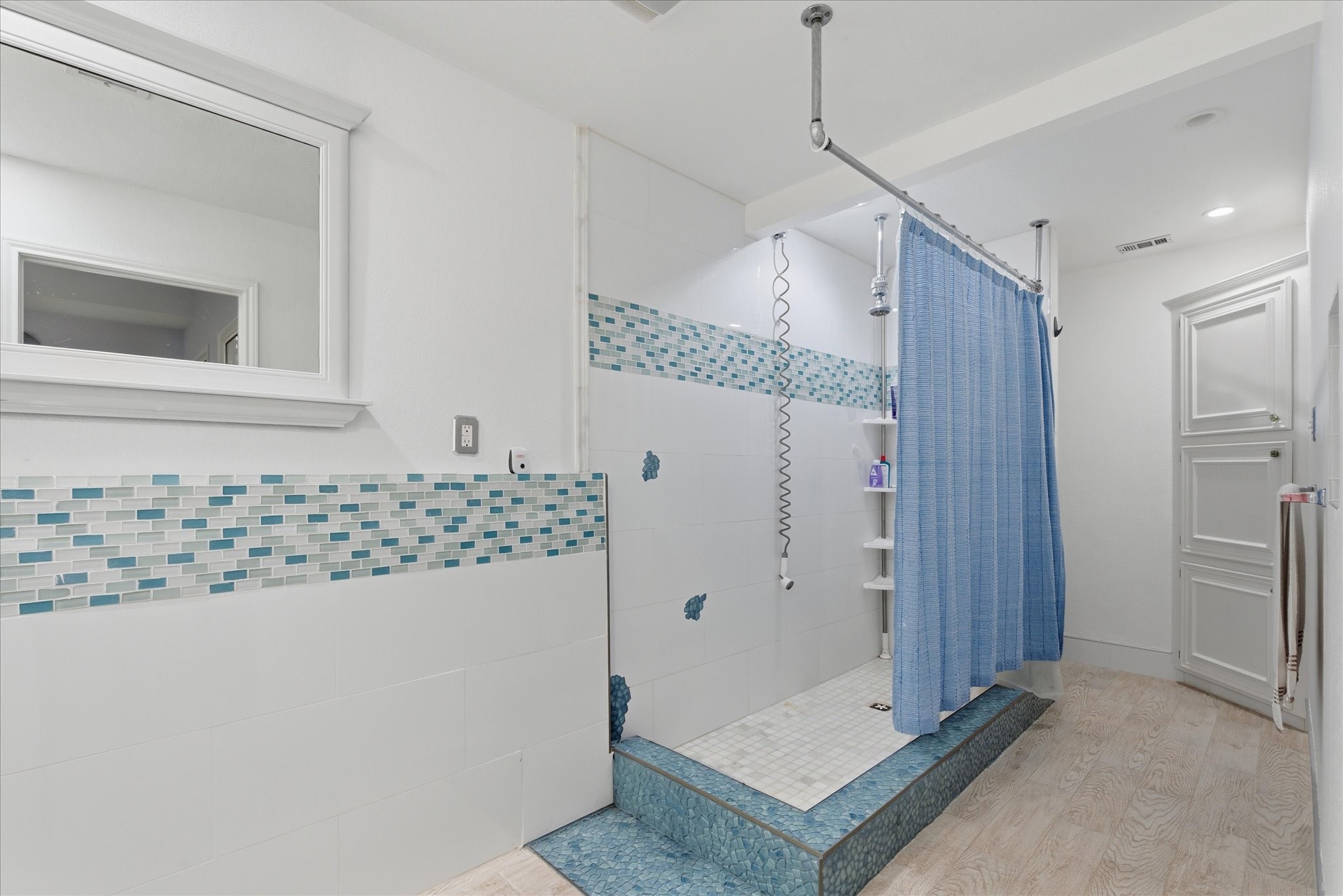 205 Don Q Baytown, TX 77523 - Photo 7 of 27 a bathroom with a shower and a sink