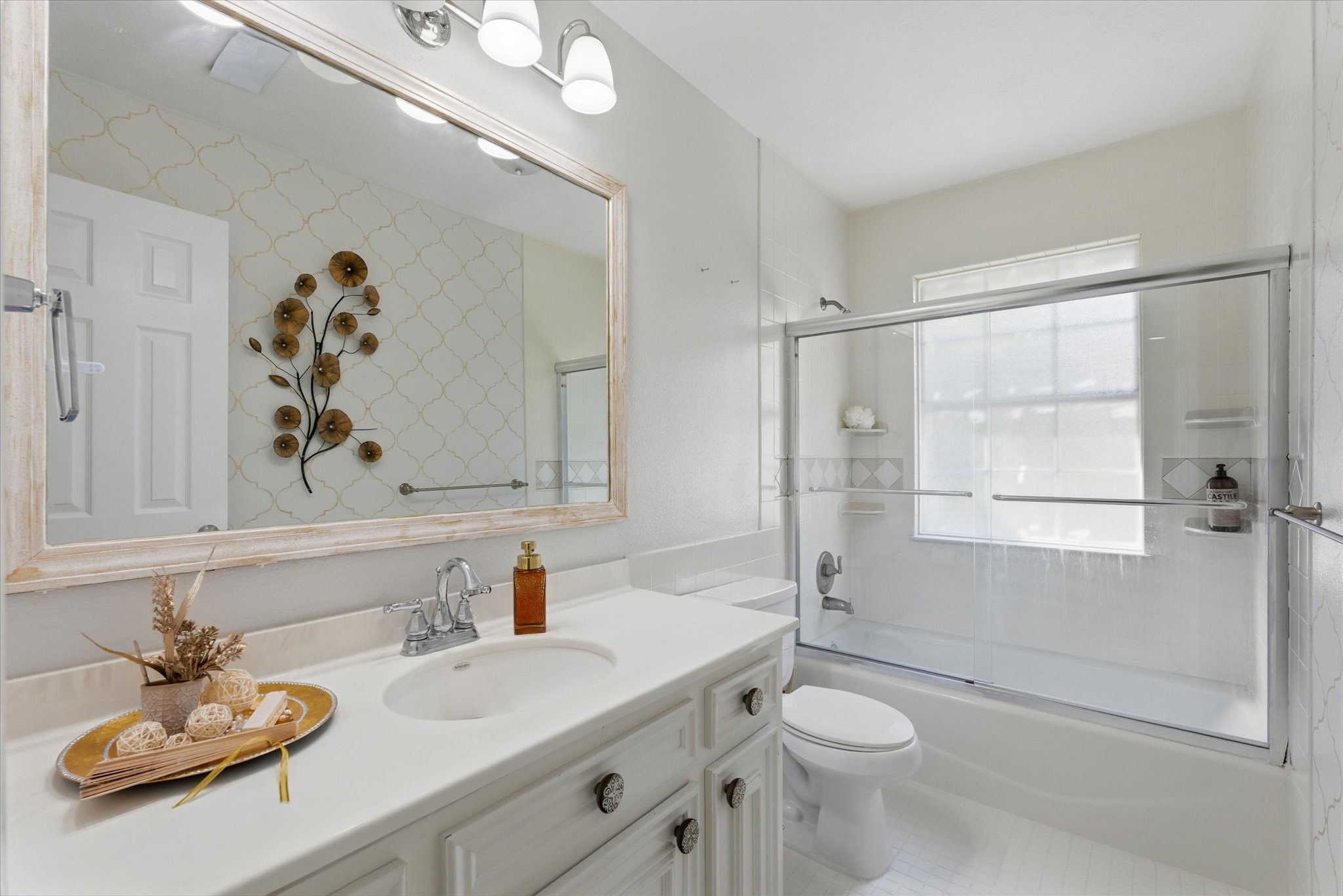 205 Don Q Baytown, TX 77523 - Photo 8 of 27 a bathroom with a sink a toilet and shower