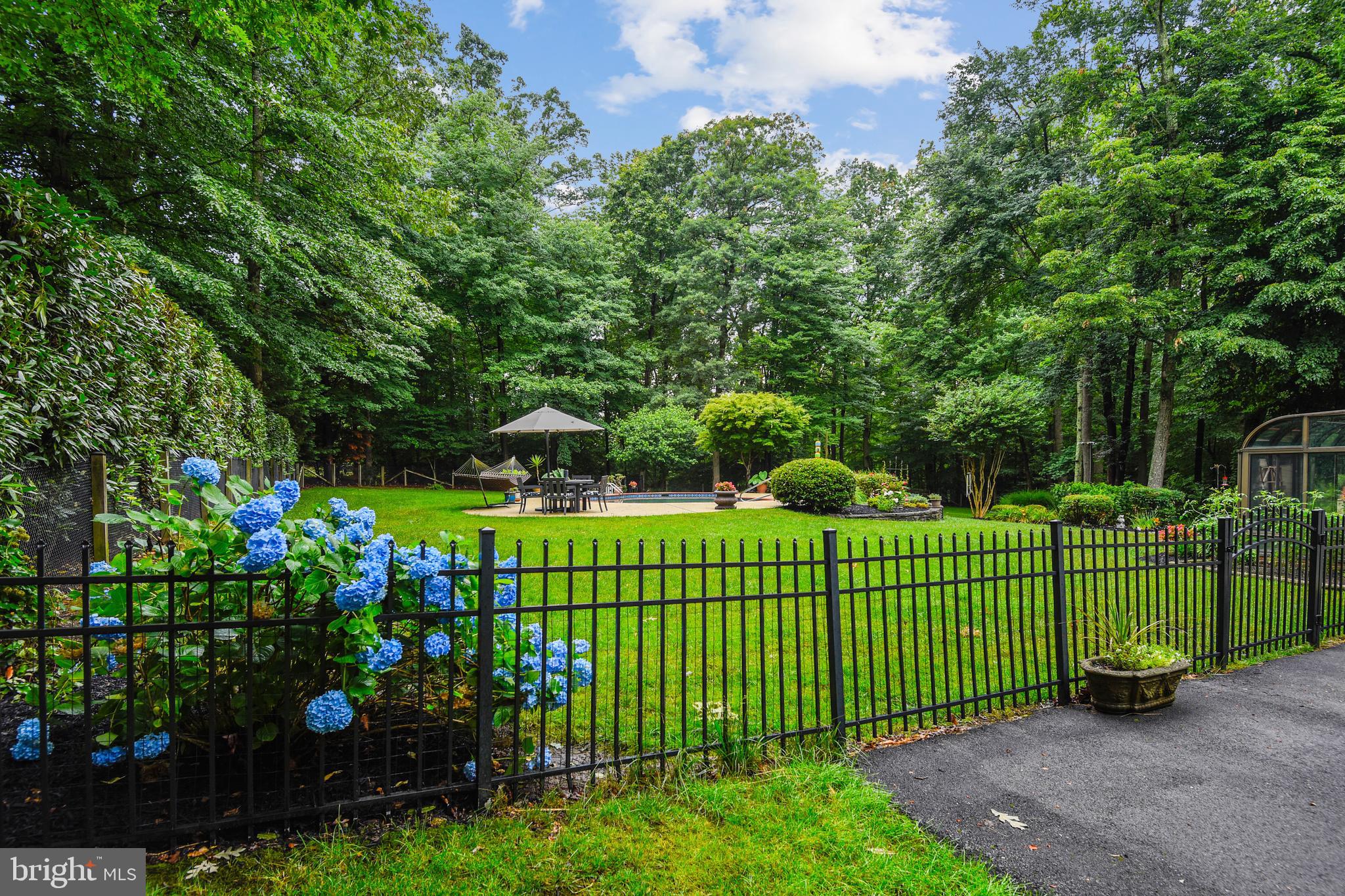 54 Colony Crossing Edgewater, MD 21037 - Photo 40 of 49 Beautiful landscaping and fenced yard with pool